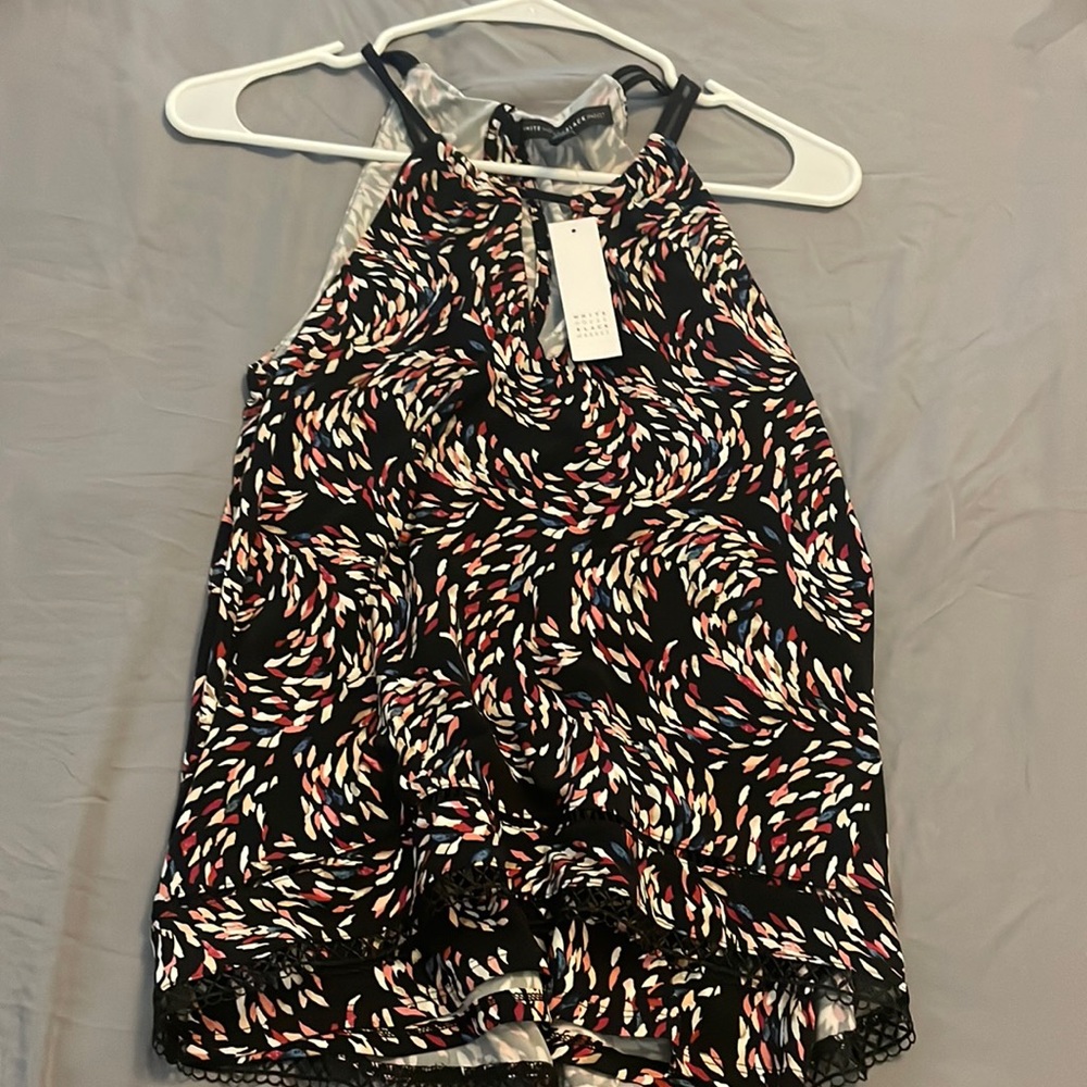 Never worn White House Black Market business top.